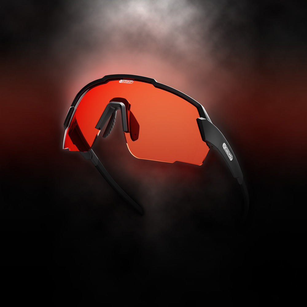 X SIght Sport Fulcrum model of shooting glasses showcasing the Vermilion lens colour option, on a dark background